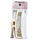 MCoBeauty Hair Claw Rectangle in a warm cream color, shown in its original retail packaging on a white background.