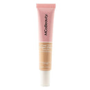 MCoBeauty Sheer Tint Super Glow Serum Foundation tube on a white background