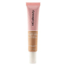 MCoBeauty Sheer Tint Super Glow Serum Foundation tube on a white background