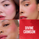 Close-up of a woman's face with blush applied, showing the 'Divine Crimson' color on a red background.