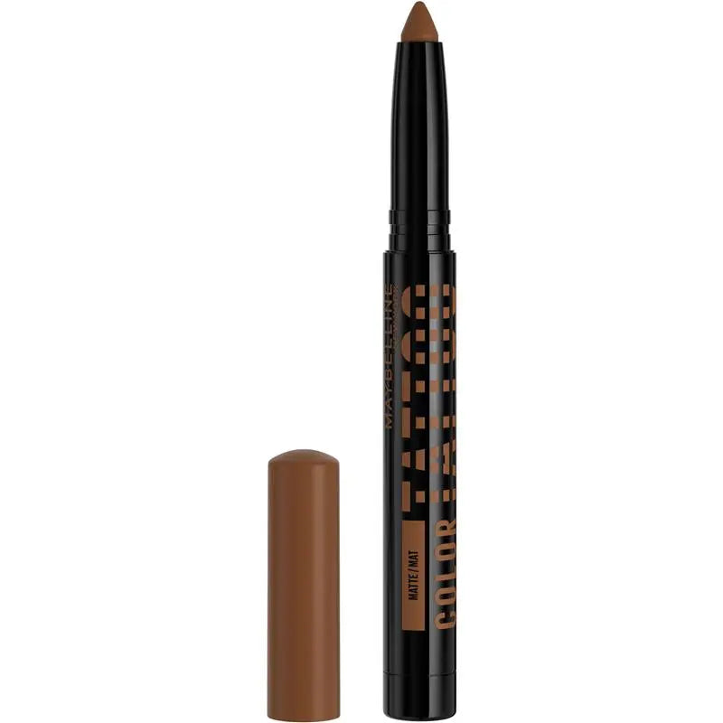 Makeup pencil with cap on a white background