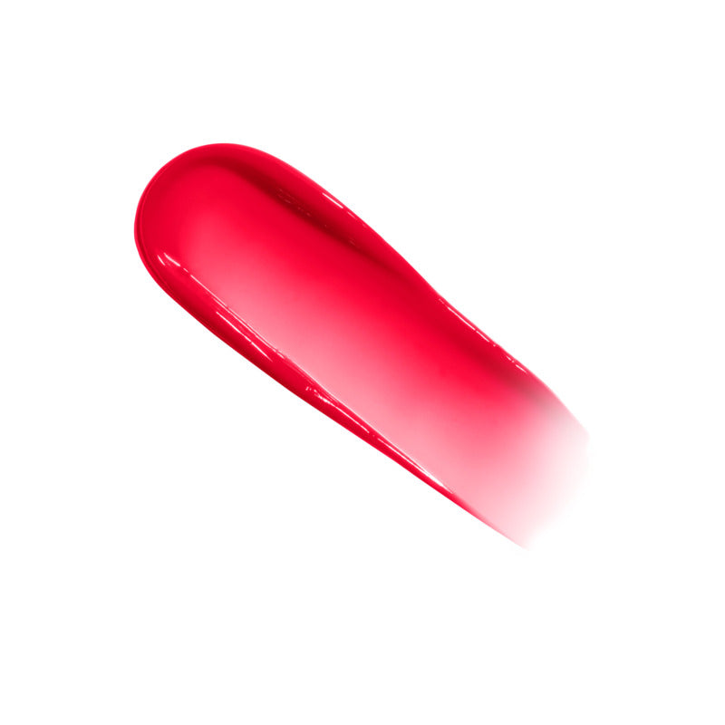 Red lip gloss swatch on a white background