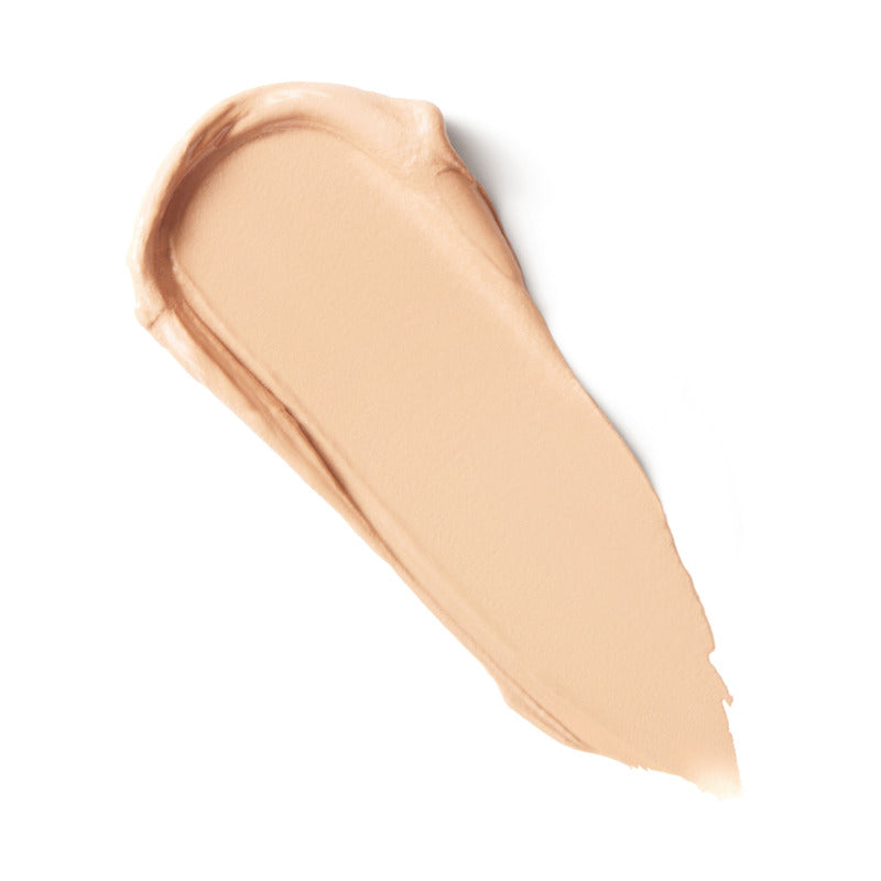 Beige makeup swatch on a white background