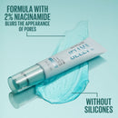 Maybelline skincare product with text about niacinamide and silicone-free formula on a light blue background