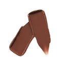 Brown lipstick swatch on a white background
