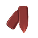 Two swatches of red lipstick on a white background