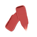 Two swatches of red lipstick on a white background