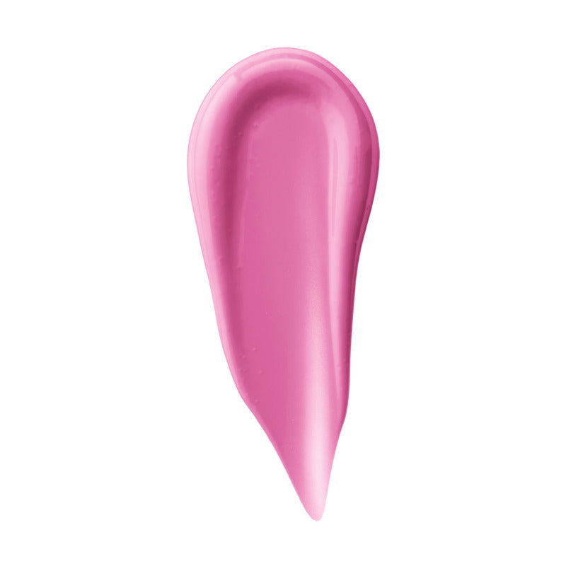 Pink lip balm swatch on a white background
