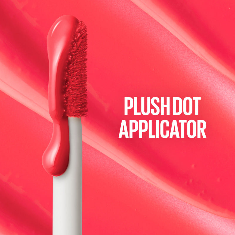 Red lipstick with plush dot applicator on a red background