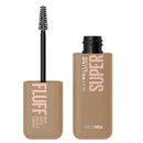 Maybelline Super Fluff brow mousse with black applicator on a white background