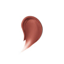 Nude-colored makeup swatch on a white background
