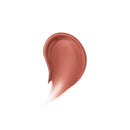 Nude-colored makeup swatch on a white background