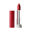 Red lipstick with Maybelline branding on a white background