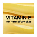 Gold-colored cream with text 'Vitamin E for normal/dry skin' on a white background