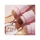 Makeup products with sponges on a pink background, featuring text 'Built In Sponge For Easy Application'.
