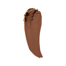 Brown makeup swatch on a white background