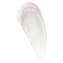 Close-up of a white cream swatch on a white background