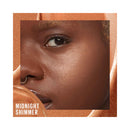 Close-up of a person's face with 'Midnight Shimmer' text on a brown background