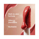 Lip brush with red lipstick and text describing features on a beige background