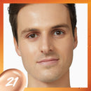 Close-up of a man's face with an orange border and number 21 on a white background