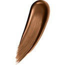 Bronze-colored makeup swatch on a white background