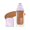 Maybelline Super Stay foundation bottle with applicator on a white background
