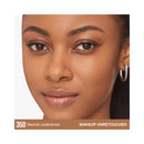 Close-up of a woman's face with neutral undertones and unretouched makeup.