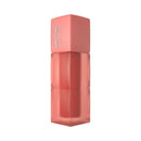 Coral-colored lipstick with 'Maybelline' branding on a white background