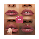 Lipstick swatches on lips with 'COY' label
