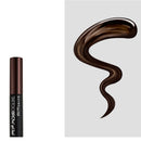 Maybelline Tattoo Brow gel with a brown hair extension on a white background