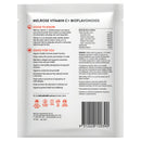 The back of a white Melrose Vitamin C + Bioflavonoids pouch, showing product information, dosage, barcode, and contact details in black and red text.