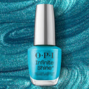 OPI Infinite Shine nail polish bottle on a blue glittery background