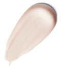 Close-up of a beige makeup product on a white background
