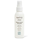 NATIO clear Breakout Control Toning Mist in a white spray bottle with a white pump dispenser, shown on a clean white background.