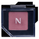 A single-pan eyeshadow compact by NARS, featuring a dusty rose pink shadow with a white stylized 'N' logo, housed in a black case with a clear plastic lid.