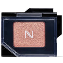 A single-pan eyeshadow compact with a sparkling rose gold shimmer powder, housed in a black case with a clear plastic lid. The brand logo 'N' is printed in white on the center of the pan.