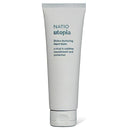 NATIO utopia Divine Nurturing Hand Balm in a white squeeze tube with blue text, shown on a clean white background.