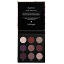 Natio eyeshadow palette with open lid showing brand information on a white background