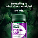 Nature's Own Evening Calm supplement bottle with green leaves in the background