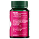Back view of a dark green and black supplement bottle with a bright pink label showing product benefits, ingredients, and an ingredient table.