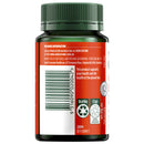 Back view of a dark green supplement bottle with a red and white label, featuring a barcode and recycling icons on a white background.