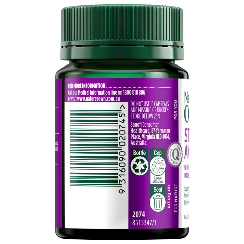 Bottle with purple label and green cap on a white background