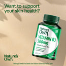 Nature's Own Vitamin B3 500mg supplement bottle on a textured beige background with promotional text.