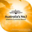 Vitamin gummy brand logo with a blurred gummy bear background