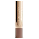 Lipstick with 'nude by nature' branding on a white background