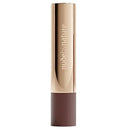 Lipstick with 'nude by nature' branding on a white background