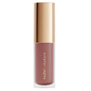 Lipstick with gold cap and clear casing on a white background
