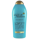 Blue shampoo bottle with gold cap labeled 'argan oil of Morocco' on a white background