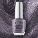 OPI Infinite Shine nail polish bottle on a glittery purple background