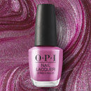 OPI nail polish bottle on a purple glittery background